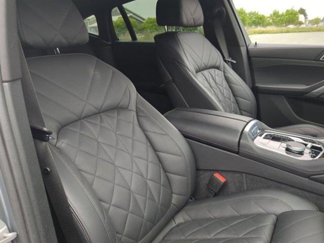 used 2024 BMW X6 car, priced at $57,636