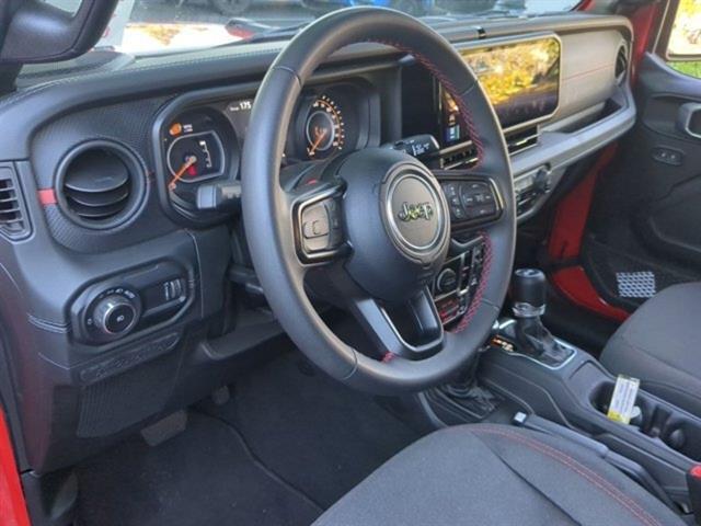 used 2024 Jeep Wrangler car, priced at $55,000