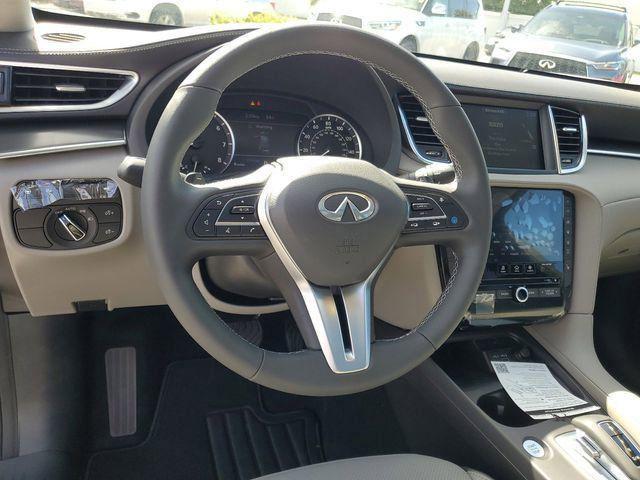 used 2025 INFINITI QX50 car, priced at $39,895