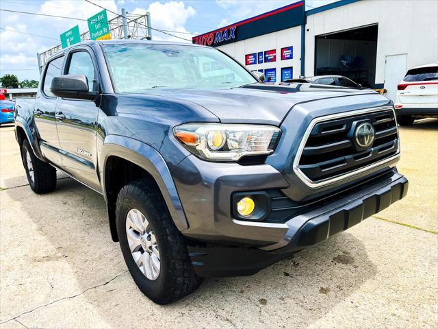 used 2018 Toyota Tacoma car, priced at $26,995