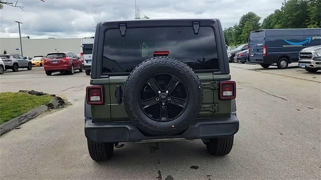 used 2021 Jeep Wrangler Unlimited car, priced at $32,694