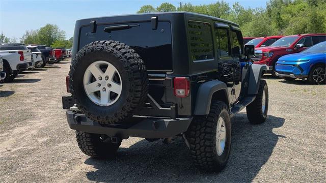 used 2012 Jeep Wrangler Unlimited car, priced at $14,999