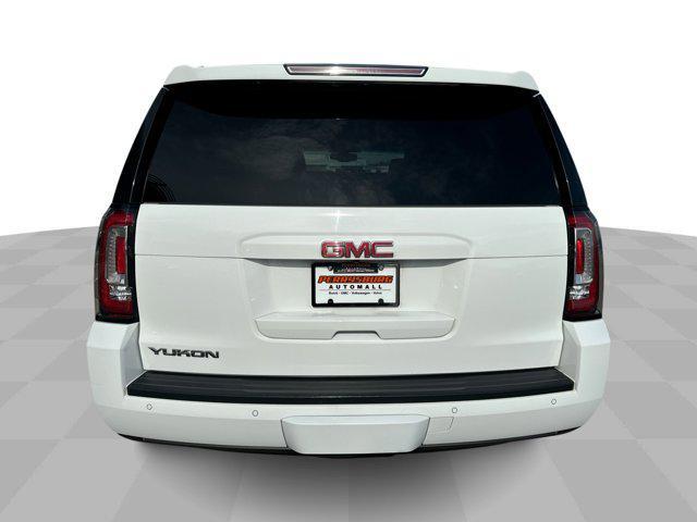 used 2015 GMC Yukon car, priced at $24,552