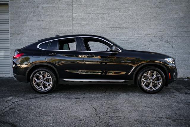 used 2023 BMW X4 car, priced at $40,495