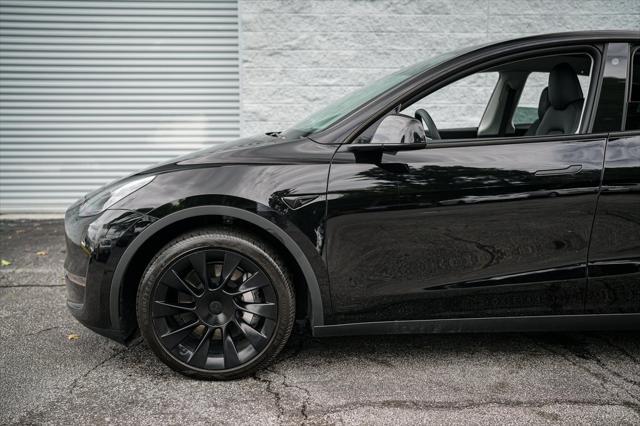 used 2023 Tesla Model Y car, priced at $32,992