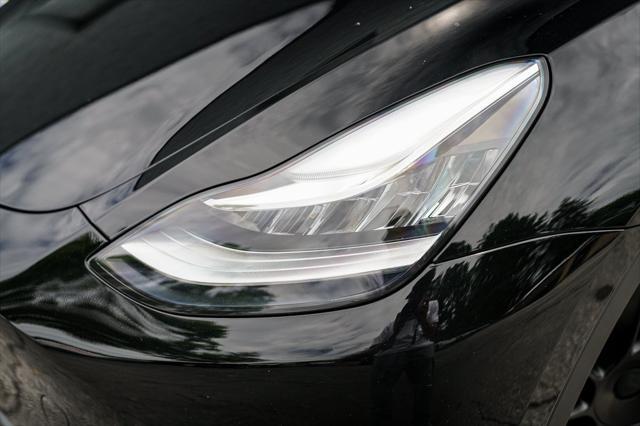 used 2023 Tesla Model Y car, priced at $32,992