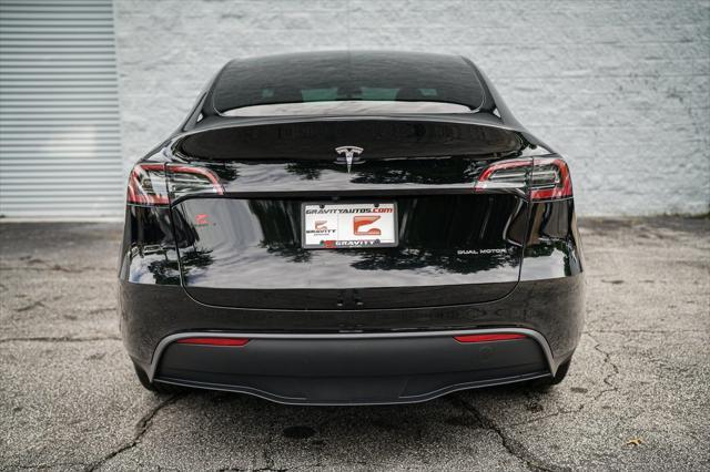 used 2023 Tesla Model Y car, priced at $32,992