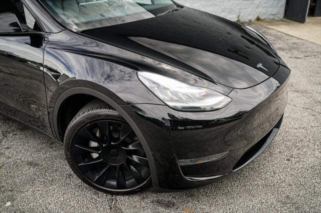 used 2023 Tesla Model Y car, priced at $32,992