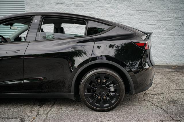 used 2023 Tesla Model Y car, priced at $32,992