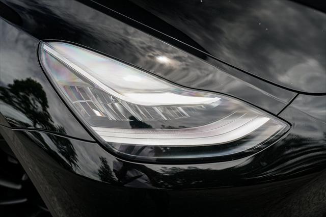 used 2023 Tesla Model Y car, priced at $32,992
