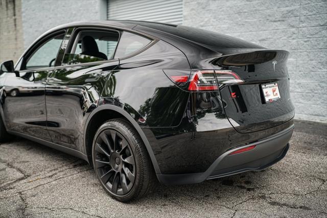 used 2023 Tesla Model Y car, priced at $32,992