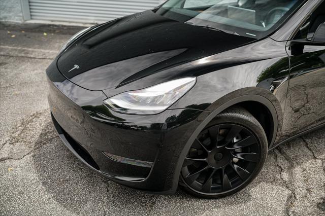 used 2023 Tesla Model Y car, priced at $32,992