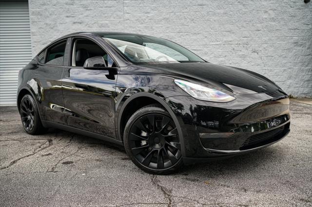 used 2023 Tesla Model Y car, priced at $32,992