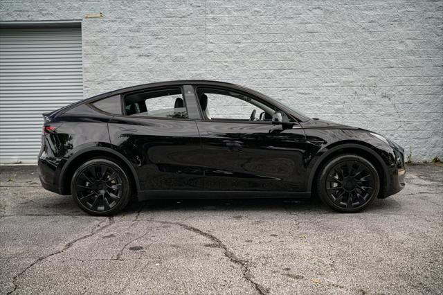 used 2023 Tesla Model Y car, priced at $32,992