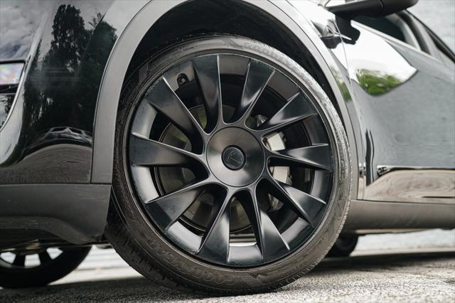 used 2023 Tesla Model Y car, priced at $32,992