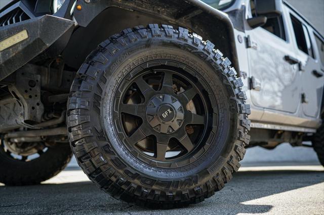 used 2019 Jeep Wrangler Unlimited car, priced at $23,932