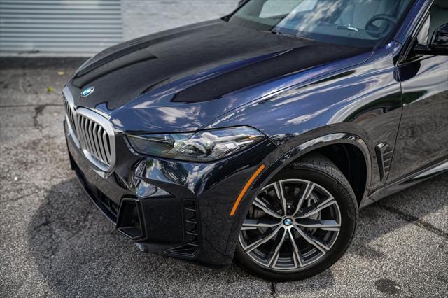 used 2024 BMW X5 car, priced at $58,192