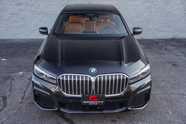 used 2022 BMW 750 car, priced at $55,995