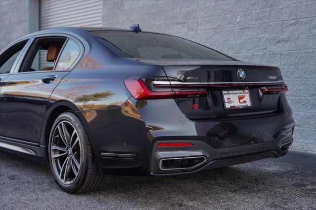 used 2022 BMW 750 car, priced at $55,995