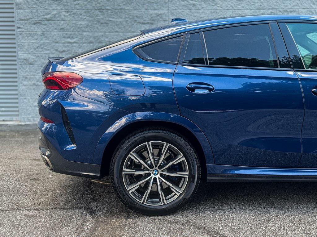 used 2022 BMW X6 car, priced at $55,495