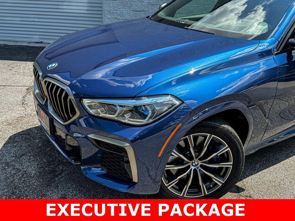 used 2022 BMW X6 car, priced at $54,295