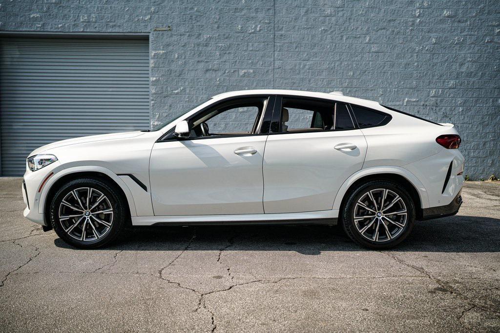 used 2023 BMW X6 car, priced at $61,092