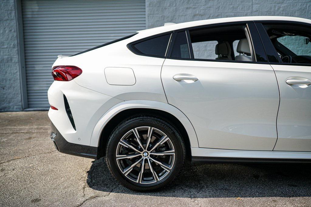 used 2023 BMW X6 car, priced at $61,092