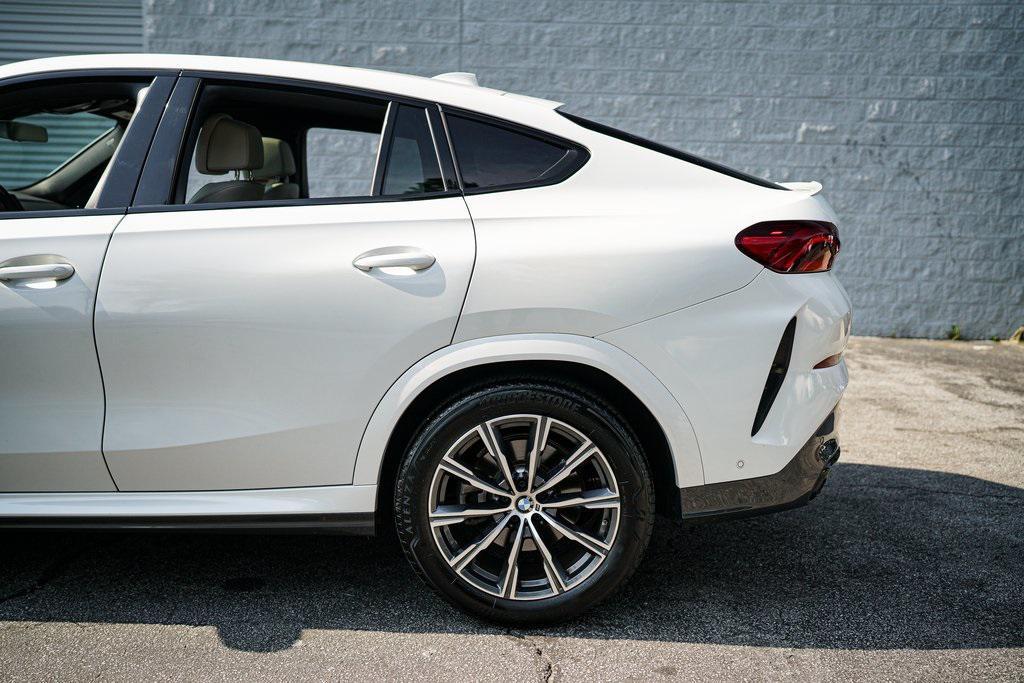 used 2023 BMW X6 car, priced at $61,092