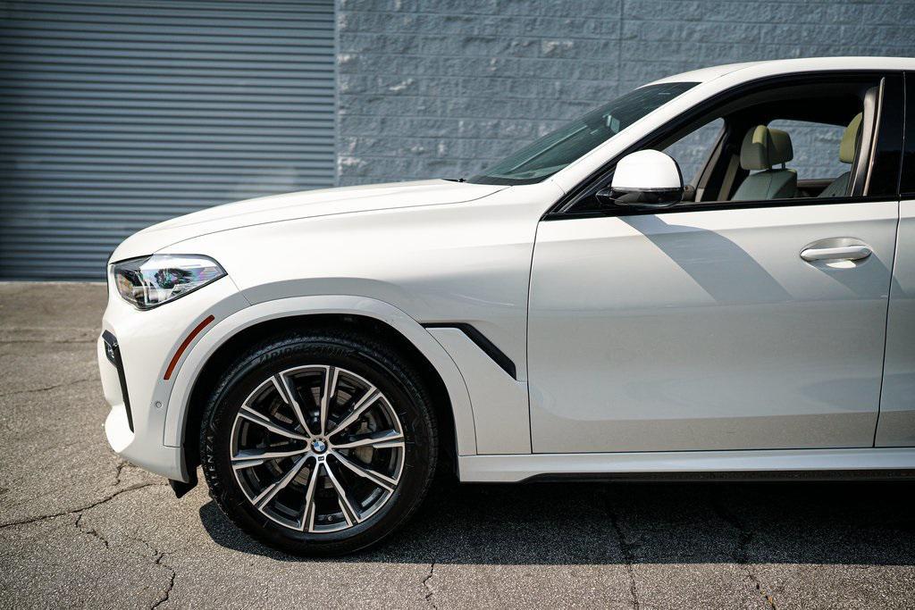 used 2023 BMW X6 car, priced at $61,092
