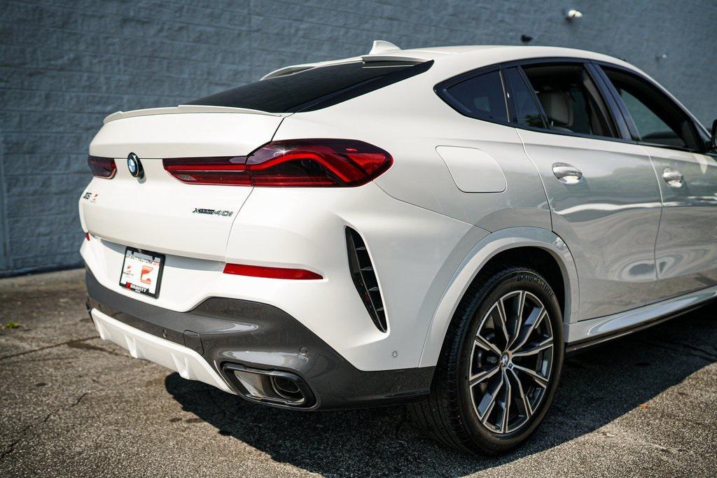 used 2023 BMW X6 car, priced at $61,092