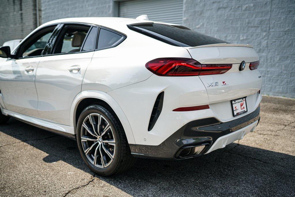 used 2023 BMW X6 car, priced at $61,092
