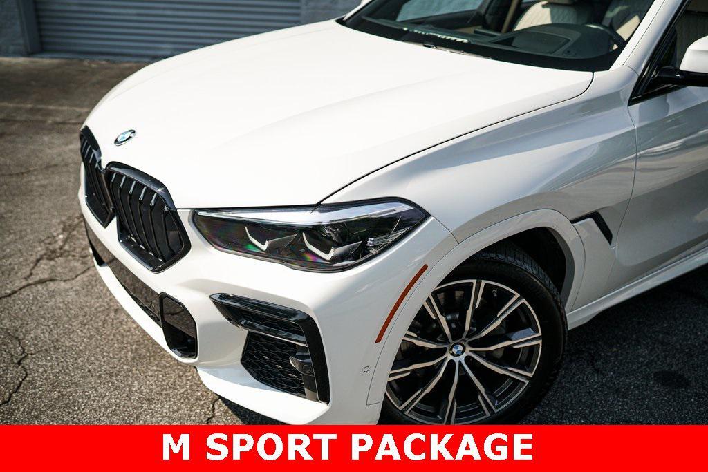 used 2023 BMW X6 car, priced at $61,092