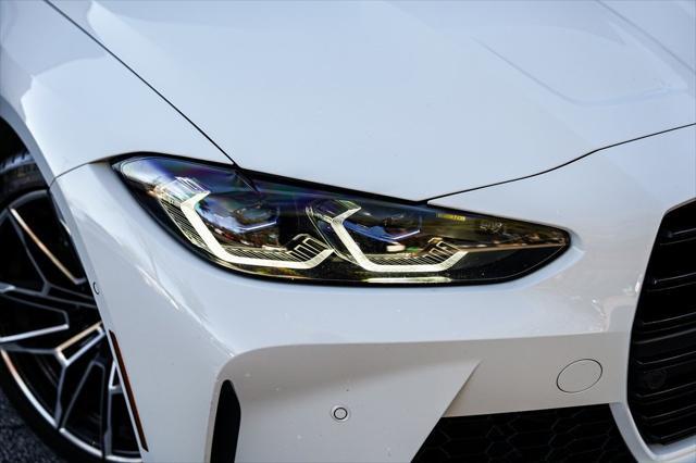 used 2022 BMW M4 car, priced at $69,997