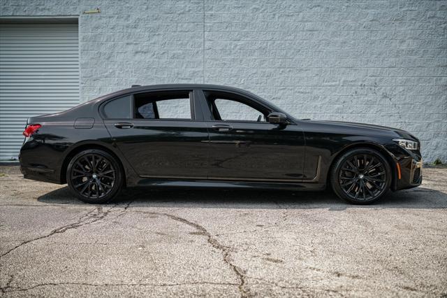 used 2022 BMW 750 car, priced at $51,495