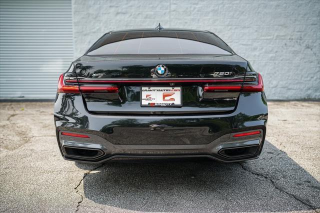 used 2022 BMW 750 car, priced at $51,495