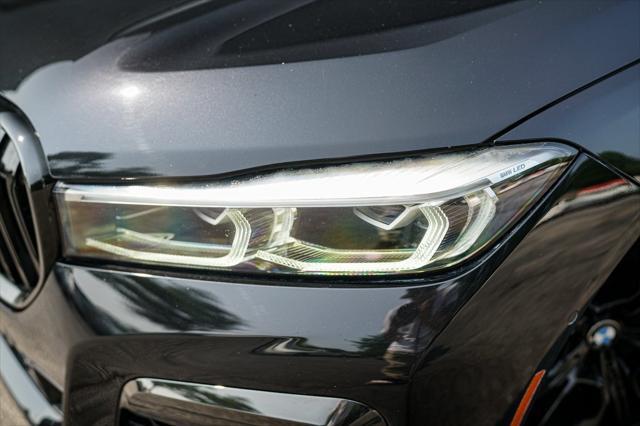 used 2022 BMW 750 car, priced at $51,495