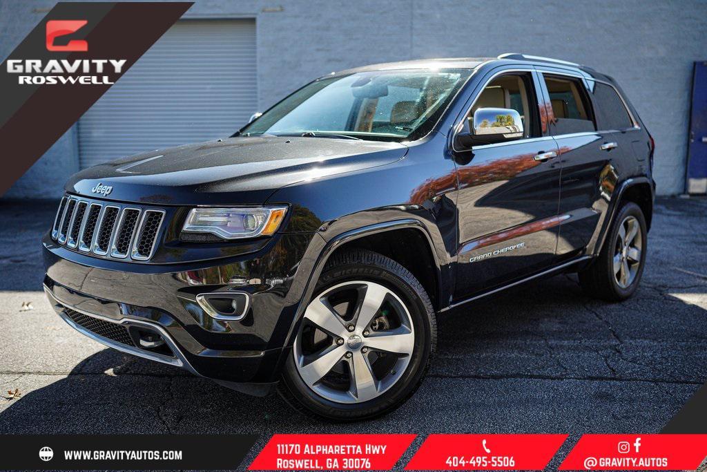 used 2015 Jeep Grand Cherokee car, priced at $13,797