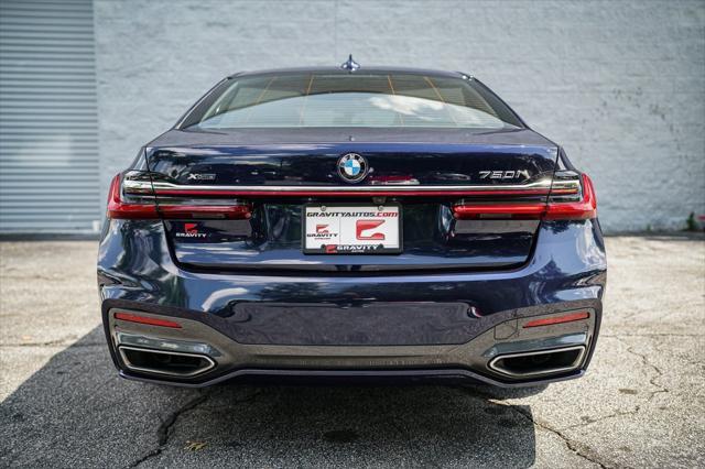 used 2022 BMW 750 car, priced at $46,492