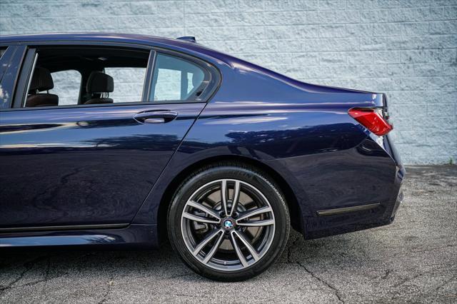 used 2022 BMW 750 car, priced at $46,492