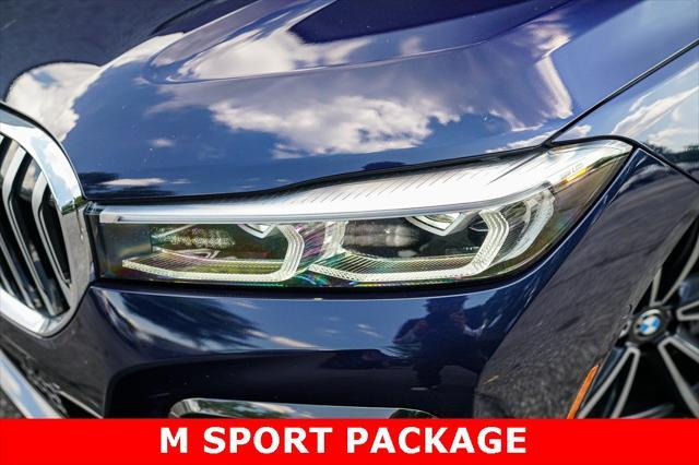 used 2022 BMW 750 car, priced at $46,492