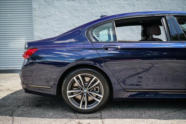 used 2022 BMW 750 car, priced at $46,492