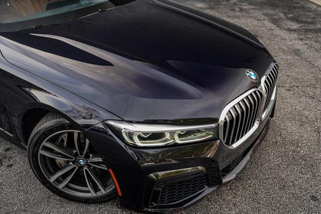 used 2022 BMW 750 car, priced at $57,497