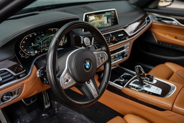 used 2022 BMW 750 car, priced at $57,497