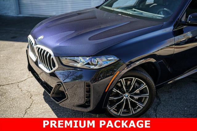 used 2024 BMW X6 car, priced at $71,667