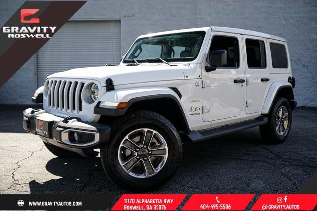 used 2021 Jeep Wrangler Unlimited car, priced at $34,092