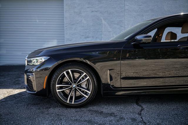 used 2022 BMW 750 car, priced at $49,467