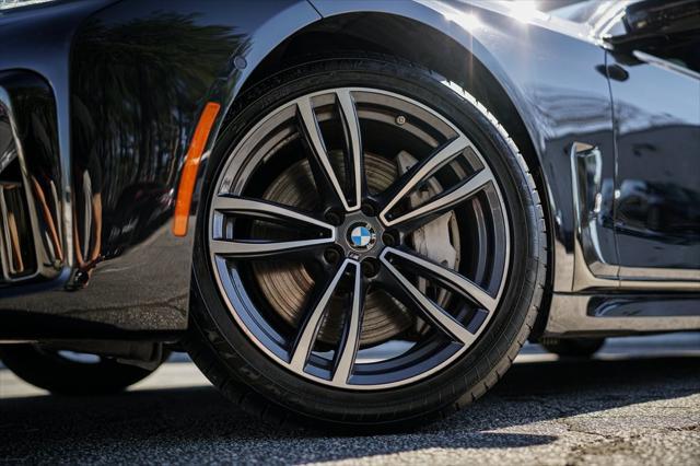 used 2022 BMW 750 car, priced at $49,467