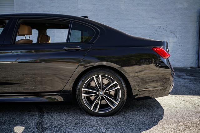 used 2022 BMW 750 car, priced at $49,467