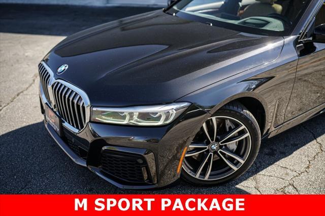 used 2022 BMW 750 car, priced at $49,467