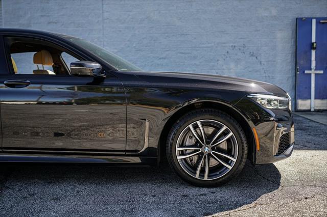 used 2022 BMW 750 car, priced at $49,467